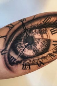 oog tattoo ramos ink bovenarm